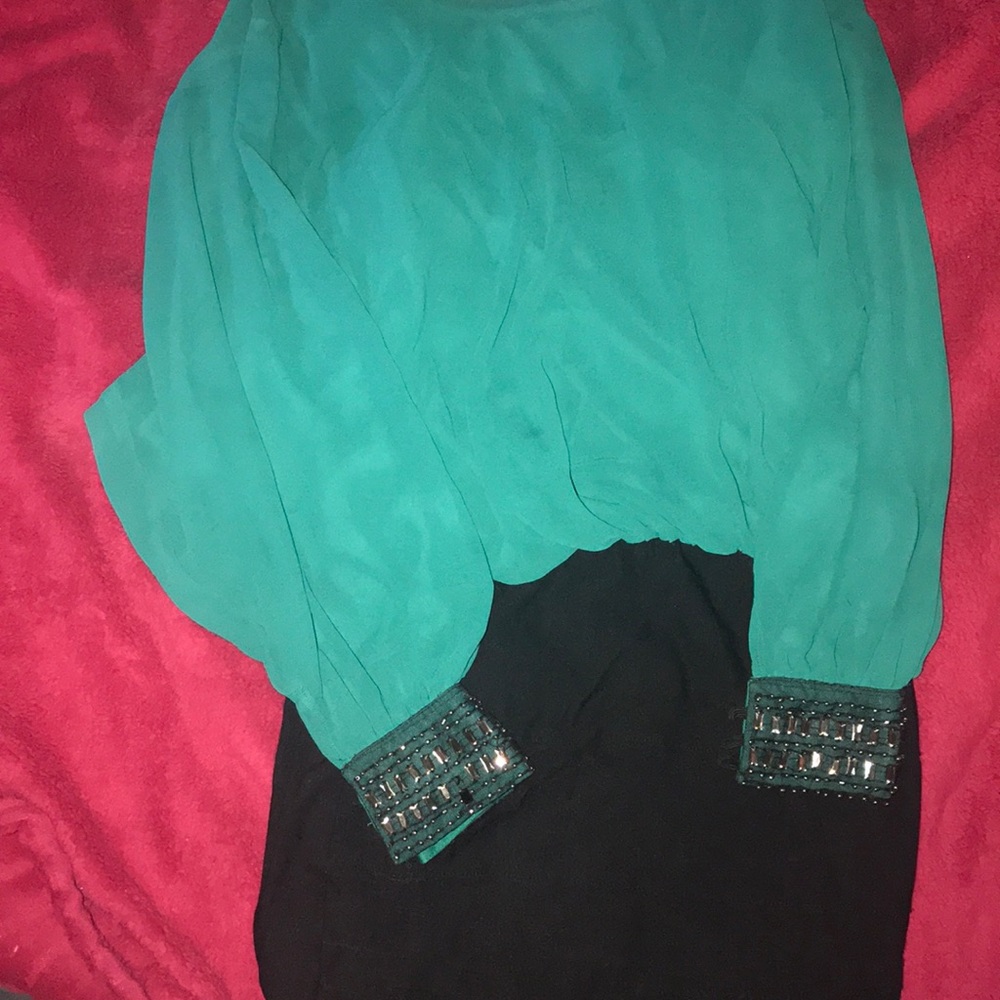 Green top and black bottom dress